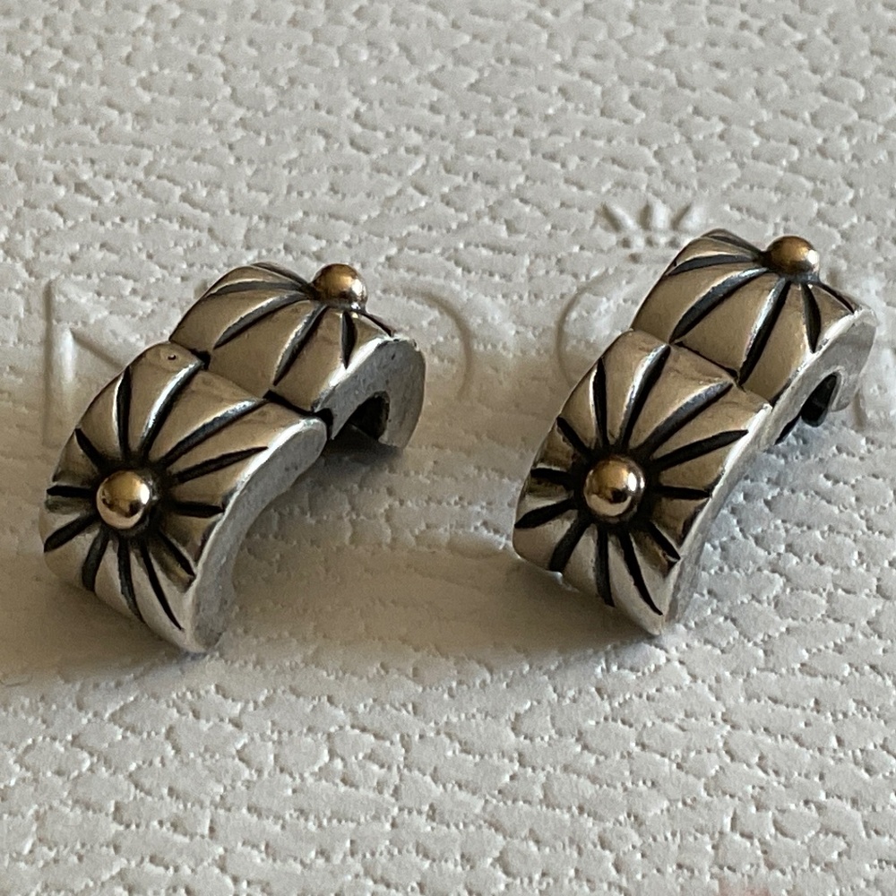 A pair of Pandora two tone clips 14k gold and silver